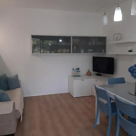 Apartamento Villaggio Olimpia