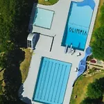 Apartamento Villaggio Olimpia